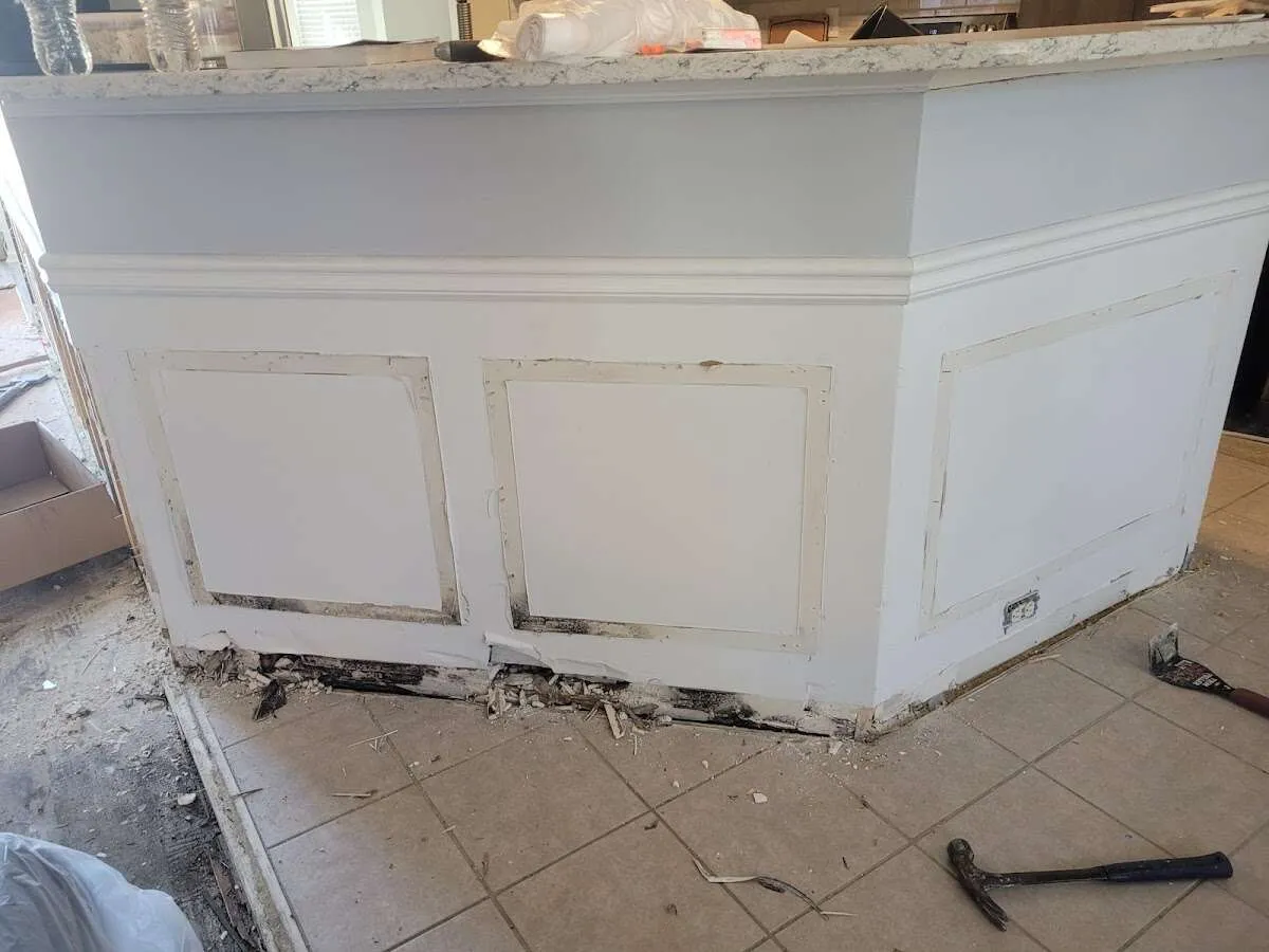 Water damage and mold on kitchen during Storm Damage Restoration in Adams